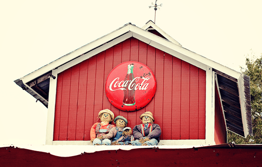 old-coca-cola-sign-on-old-barn