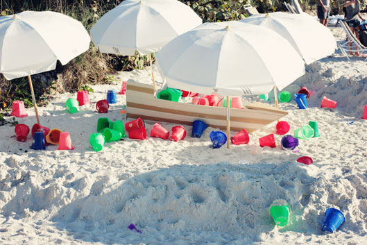 childrens-sand-pails-on-cla