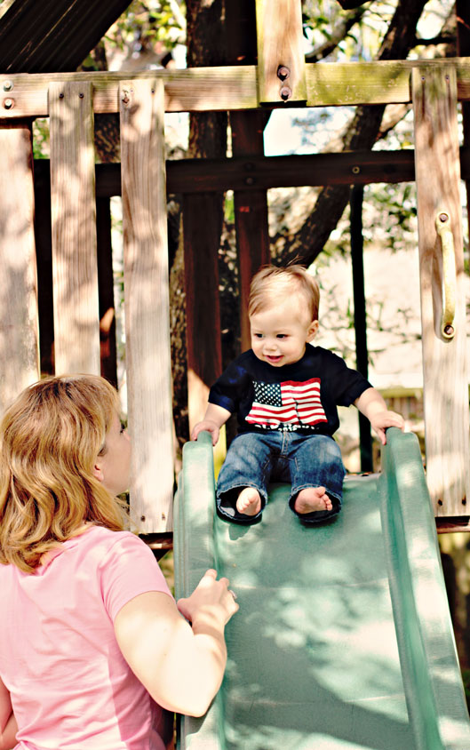 toddle-going-down-slide-wit