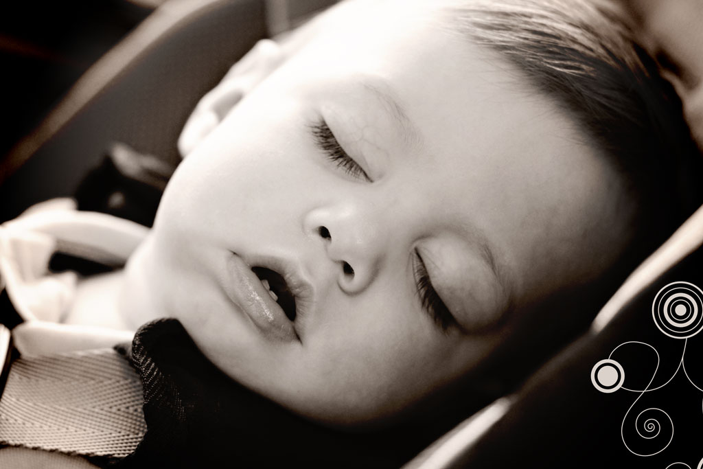 baby-boy-sleeping-car-seat-