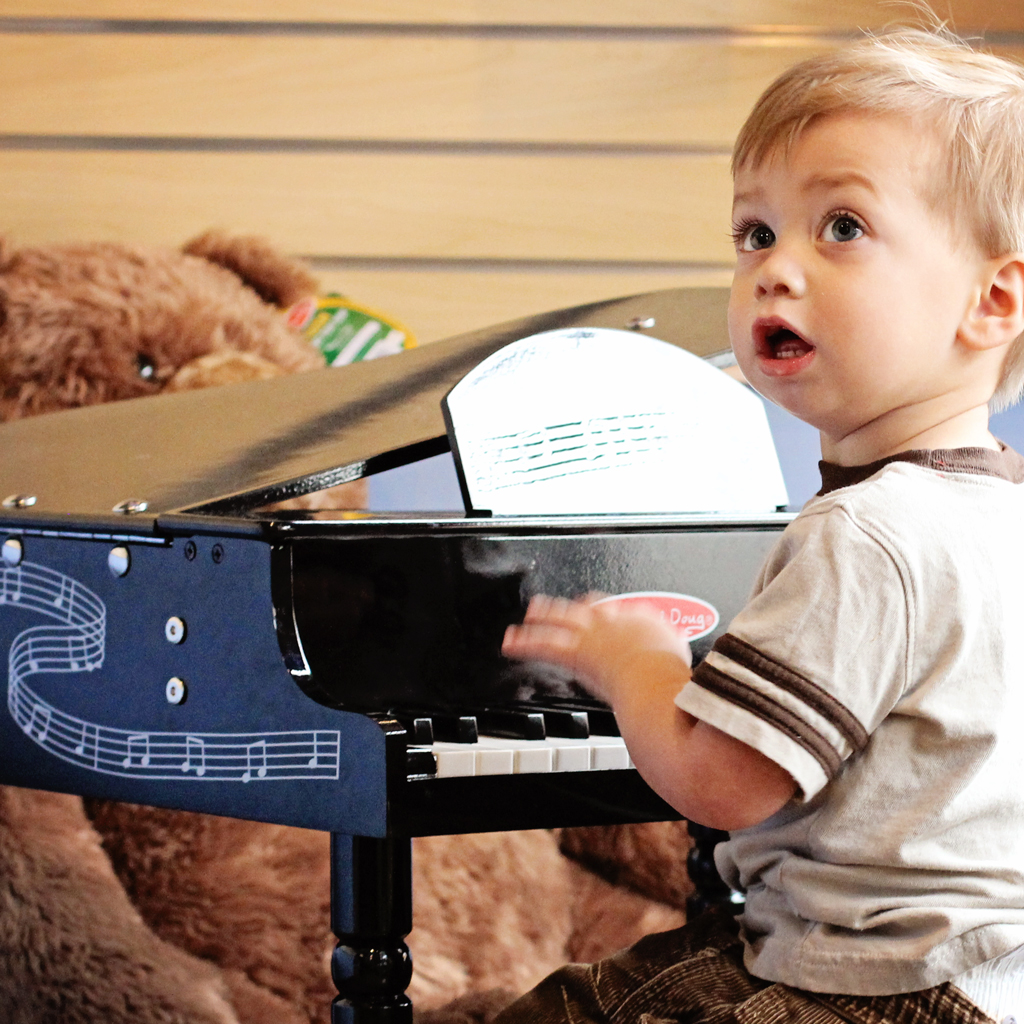 adorable-toddler-playing-childs-piano