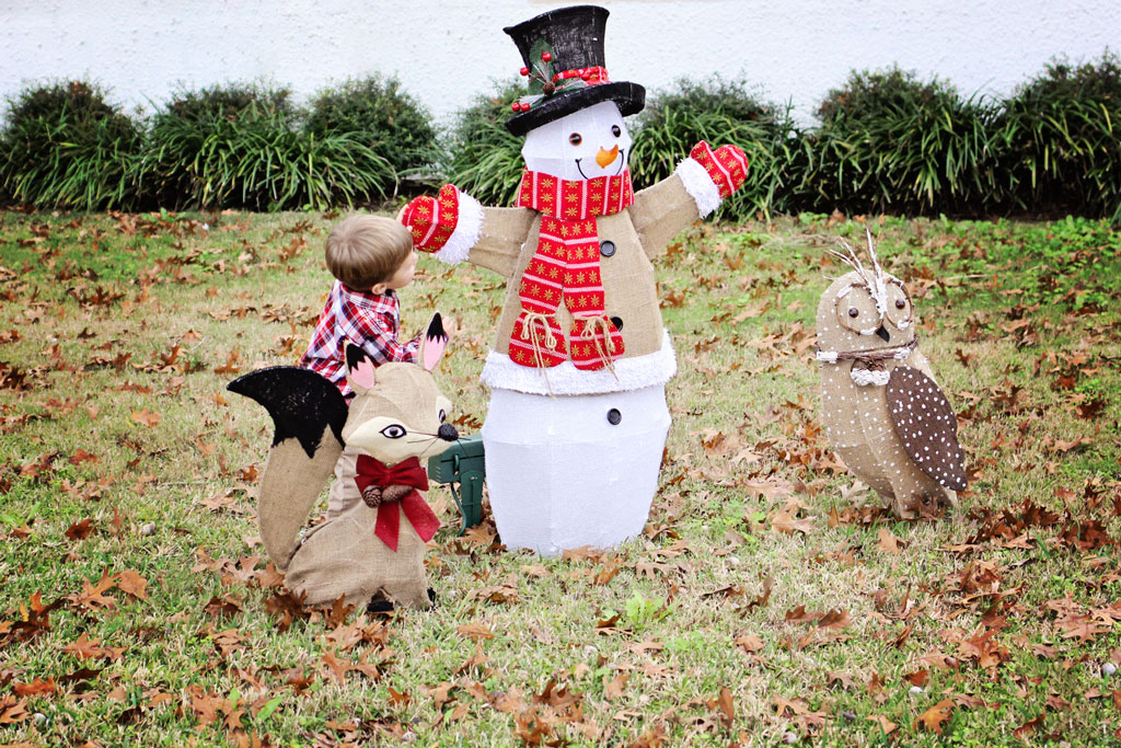 child-with-snowman-at-christmas