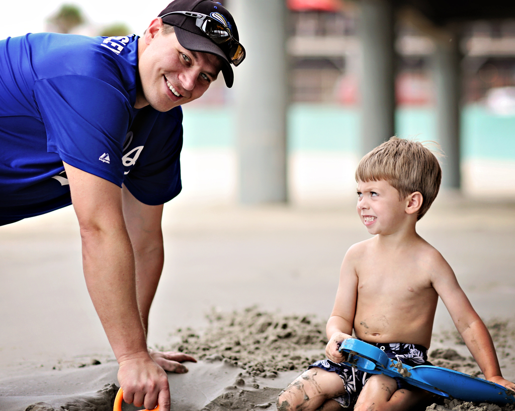 dadandsonbuildingcastleinsand